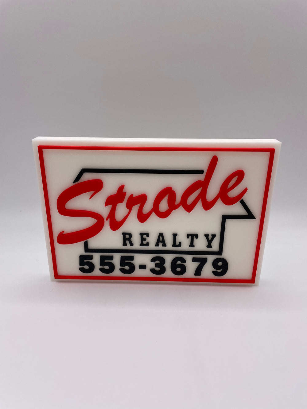 Halloween strode realty sign