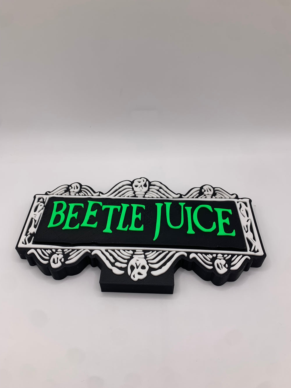Beetle juice sign