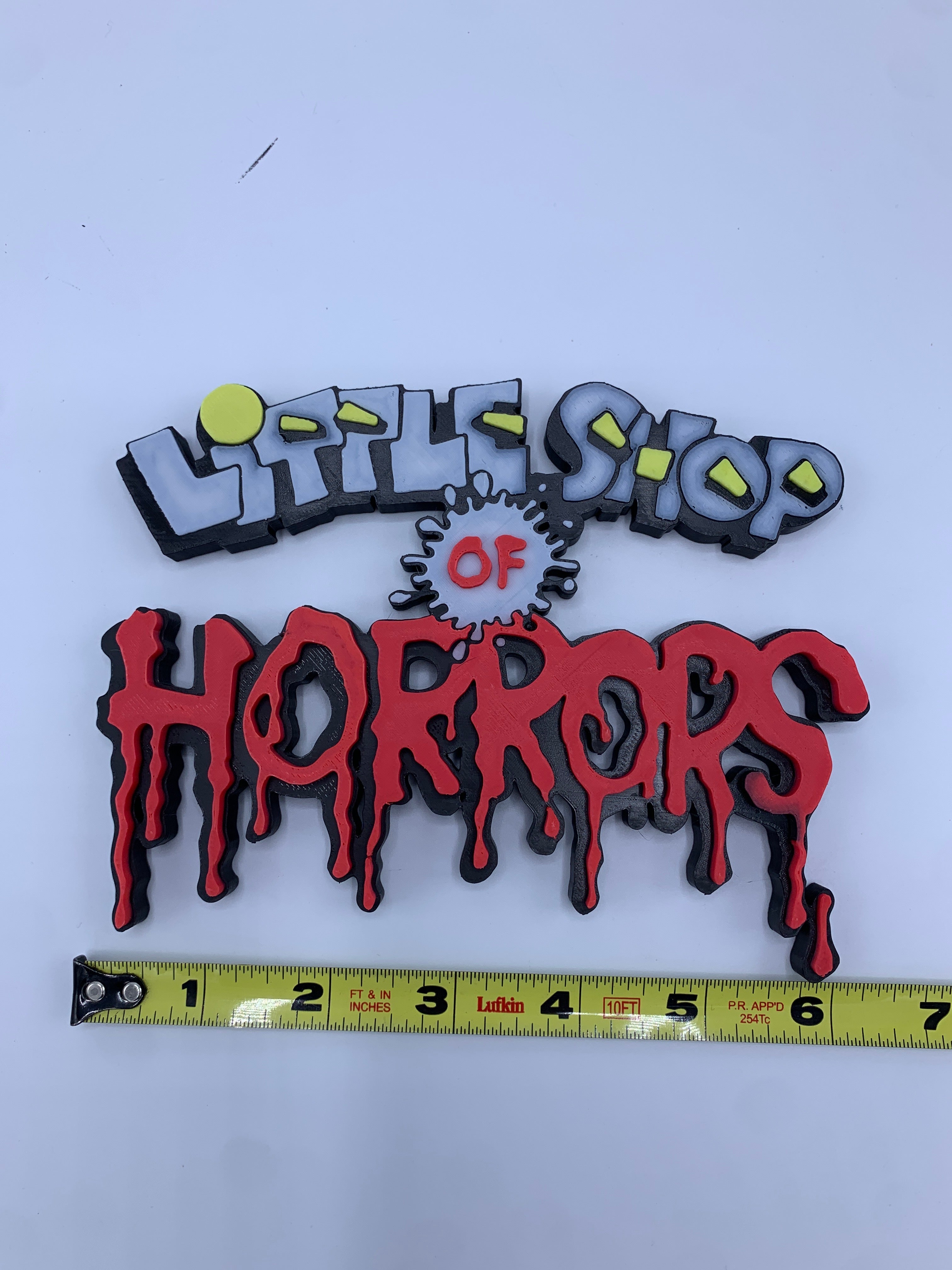 Little shop of horrors sign