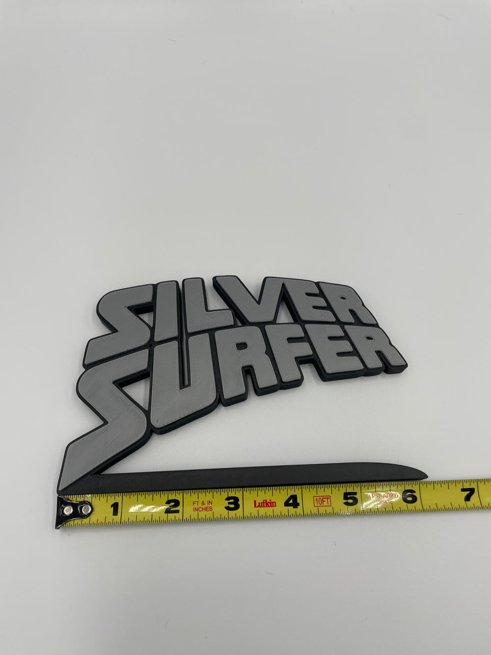 Silver surfer sign